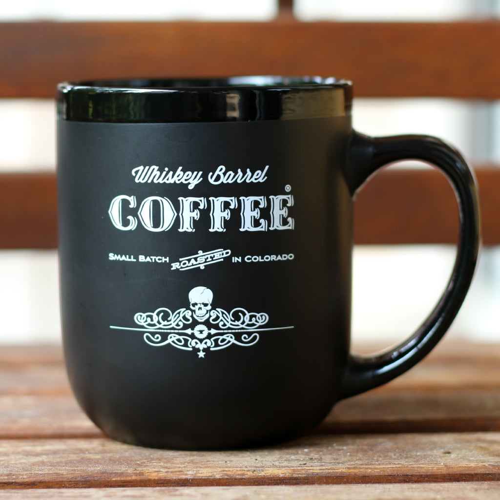https://whiskeybarrelcoffee.com/cdn/shop/products/whiskey-barrel-coffee-mug-16oz-ceramic-black-logo.jpg?v=1629491391